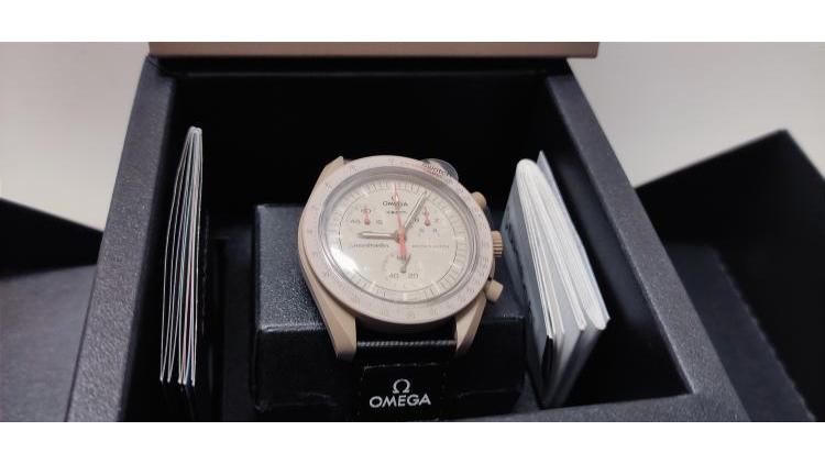 Omega Swatch Jupiter, completo di corredo.