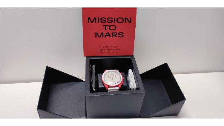 Omega Swatch Mars, completo di corredo.